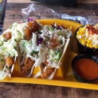 Walleye Tacos · beer battered, pineapple salsa, cabbage blend, chipotle mayo, queso fresco, flour tortillas
