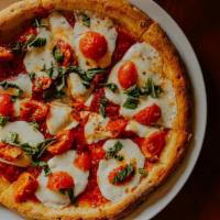 Margherita Pizza · fresh mozzarella, roma tomato, basil, house red sauce, balsamic glaze drizzle