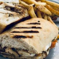 Grilled Chicken Panini · grilled chicken, caramelized onions, roasted tomatoes, fresh mozzarella, roasted garlic basi...
