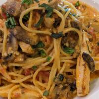 Rosa'S Chicken Spaghetti · Grilled chicken, fresh mushrooms, basil, tomato vodka sauce, parmesan cheese