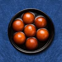 Dumpling Desire · Soft delicious berry sized balls made of milk solids, flour & sugary syrup.