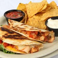 Chicken Quesadillas · Two flour tortillas filled with grilled chicken breast, pepper jack, cheddar and salsa. Serv...