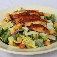 Chicken Caesar Salad · Grilled Amish chicken breast on a bed of romaine with fresh croutons, sweet red onions, parm...