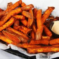 Basket Of Sweet Potato Fries · A basket of our hand cut sweet potato fries. Served with our homemade horsey sauce.