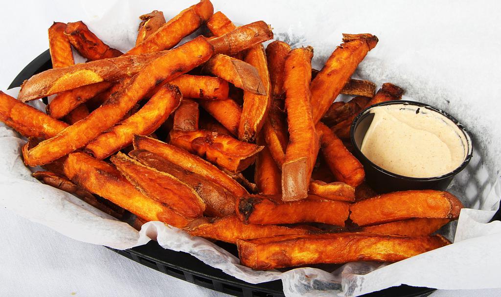 Basket Of Sweet Potato Fries · A basket of our hand cut sweet potato fries. Served with our homemade horsey sauce.