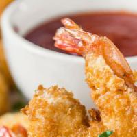 Coconut Shrimp (8) · Served with sweet chili sauce.