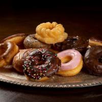 Dozen Special Donuts (Glazed & Donut Mix) · Round donuts(glazed and cake kinds)only. Additional charge for French crullers:
 $0.20/each ...
