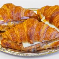 Croissant Sandwich · Ham or Sausage   with Swiss cheese and egg