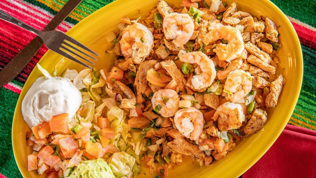 Camarones De Cozumel Lunch · Grilled shrimp, chicken and pico de gallo sauteed in our spicy butter sauce served on a bed of rice.