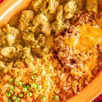 Carne De Puerco Con Chile Verde · Selected chunks of pork and green chile sauce served with rice and refried beans.