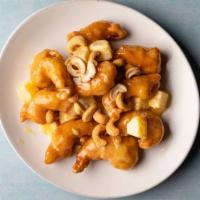 Honey Shrimp · Crispy Shrimp finger with  pineapple and special Honey sauce  topped with Cashews.