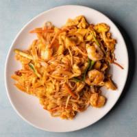 Pad Thai · Rice noodle with shrimp chicken onion carrots bean sprouts green scallion ground peanuts and...