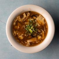 Hot & Sour Soup · Tofu bamboo shoots egg and shredded agaric mushrooms.