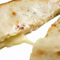 Cheese Naan · Naan stuffed with cheese and baked.