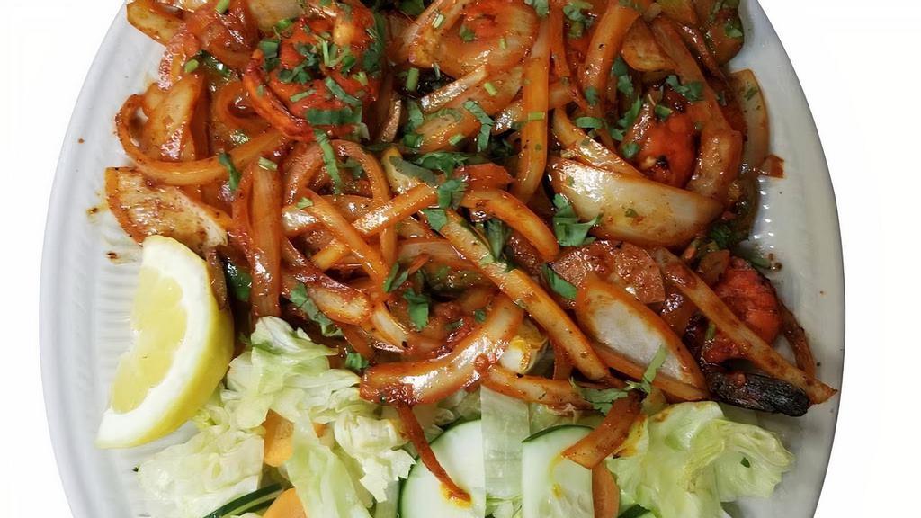 Tandoori Mixed Grill · A combination of tikka, tandoori chicken, shrimp, sheek kabab, and boti kabab. Served with naan or rice.