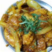 Jalfrezi · Cooked with onion, green pepper, ginger, and delicious spices. Served with naan or rice come...