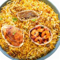 Chef'S Special Biryani · A combination of shrimp, chicken and lamb cooked with aromatic spices and flavorful basmati ...