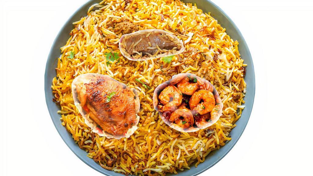 Chef'S Special Biryani · A combination of shrimp, chicken and lamb cooked with aromatic spices and flavorful basmati rice.