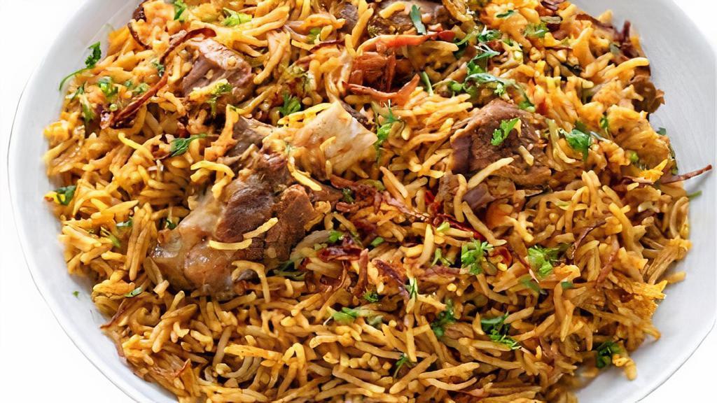 Beef Biryani · Finest basmati rice cooked with beef and a touch of curry sauce garnished with nuts and raisins.