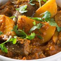 Aloo Baingan · Sautéed eggplant cooked with potato, onion, herb, and spice. Served with rice or naan
