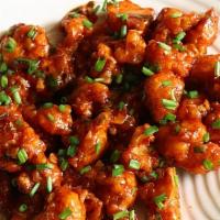 Gobi Manchurian · Fried cauliflower cooked with fairly hot chili sauce. Served with naan or rice. Comes Medium...