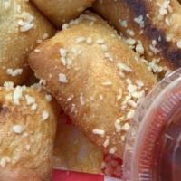 Chubby Bread · 10 pieces. Bread sticks covered in garlic butter and Parmesan, comes with dipping sauce.