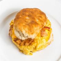 Rise And Shine · Scrambled eggs with melted American cheese and your choice of ham, applewood smoked bacon or...