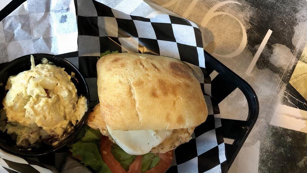Grilled Chicken Pesto · New. Served with a side of your choice and our classic pickle spear. Ciabatta, chicken breast, lettuce, tomato, fresh mozzarella, parmesan and pesto ranch dressing.