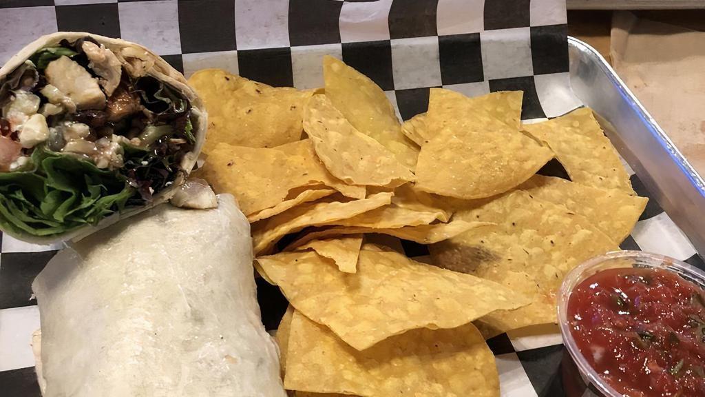 Tavern Wrap · Our Tavern salad, with grilled chicken, cranberries, bleu cheese crumbles, sunflower seeds and balsamic vinaigrette dressing served in our fresh wrap. Served w/Tortilla Chips & Salsa.
