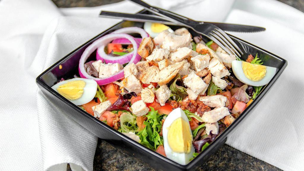 Chief'S Chicken Salad · Mixed greens, topped with diced tomatoes, onions, egg, bacon bits, shredded cheese blend and your choice of grilled or fried chicken. Make it buffalo style for no extra charge!