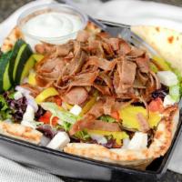 Gyro Salad · Grilled gyro meat, diced tomatoes, Feta cheese, cucumbers, banana peppers, and red onion ser...