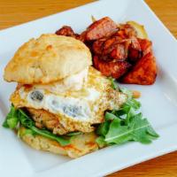 Chicken Sausage Biscuit · Breakfast chicken and roasted apple sausage patty, brie cheese, sunny side up egg, and arugu...
