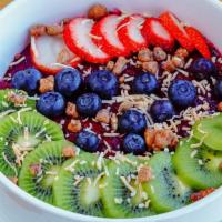 Triple Berry Smoothie · A blend of strawberries blackberries and blueberries topped with toasted coconut candied wal...