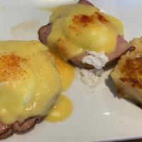 Classic Benedict · Sliced ham, poached egg, English muffin, and hollandaise.