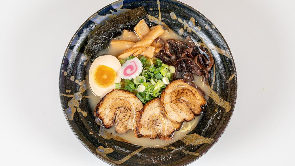 Char Siu Ramen · Roasted pork belly, fish cake, half cooked egg, bamboo shoot, fungus, green onion and black garlic oil in soy sauce base.