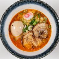 Spicy Miso Ramen · Ramen noodle with spicy miso, topped with char siu (roasted pork belly), whole egg, green on...