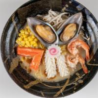 Seafood Ramen · Shrimp, muscle, squid, crab meat, fish cake, bean sprouts, corn and black garlic oil in miso...