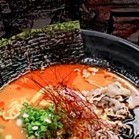 Kimchi Ramen · Spicy. Sliced beef, fish cake, kimchi, bamboo shoot, green onion, red chili pepper, spicy oi...