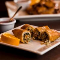 Lanna Spring Rolls (2) · Chicken, carrots, celery, ear mushrooms, clear noodles, cilantro and black pepper wrapped in...
