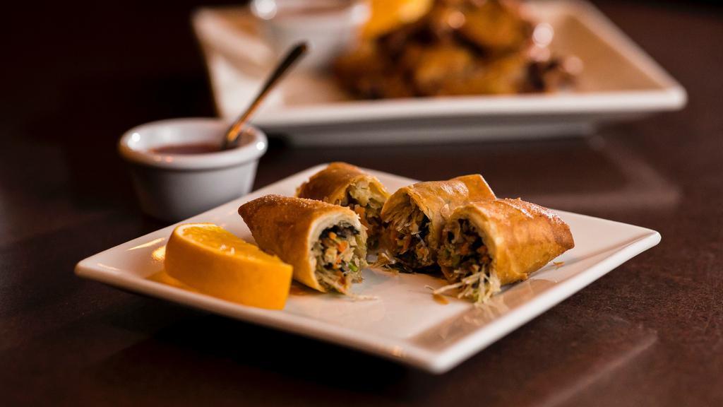 Lanna Spring Rolls (2) · Chicken, carrots, celery, ear mushrooms, clear noodles, cilantro and black pepper wrapped in a spring roll wrapper, then deep fried. Served with Lanna sweet and sour sauce.