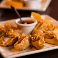 Thung Tong · Crispy fried wontons stuffed with cream cheese, crab, and green onions
