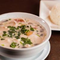 Tom Kha Gai · Mild and delicious soup made with chicken, coconut milk, galangal, kaffir lime leaves, lemon...