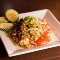 Lanna Khao Pad · Thai fried rice with choice of meat, green peas, carrots, yellow onions, and tomatoes. Toppe...