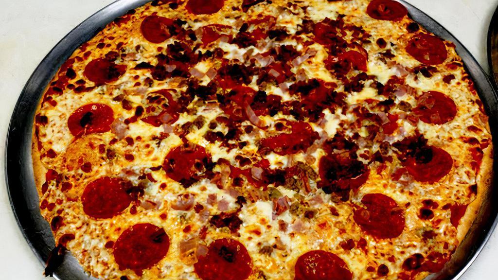 Mad Meat 16” Thin Crust · Italian sausage, pepperoni, ham, and bacon.