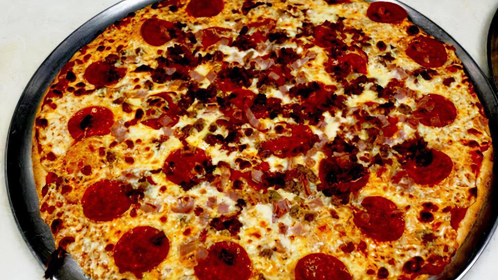 Mad Meat 12” Thin Crust · Italian sausage, pepperoni, ham, and bacon.