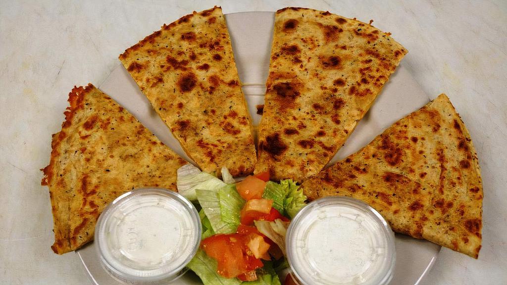 Chicken Quesadilla · Served with lettuce, salsa and sour cream.