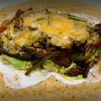 Steak Fajita Wrap · Grilled green peppers and onions, lettuce, tomatoes, cheese, and chipotle ranch.