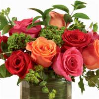 Lush Life Rose Bouquet · Hot pink, orange, and red roses capture the eye and the imagination accented with green trac...