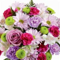 Purple Pop! Bouquet · Perfectly grape, this stunning flower bouquet consists of lavender roses, carnations and tra...