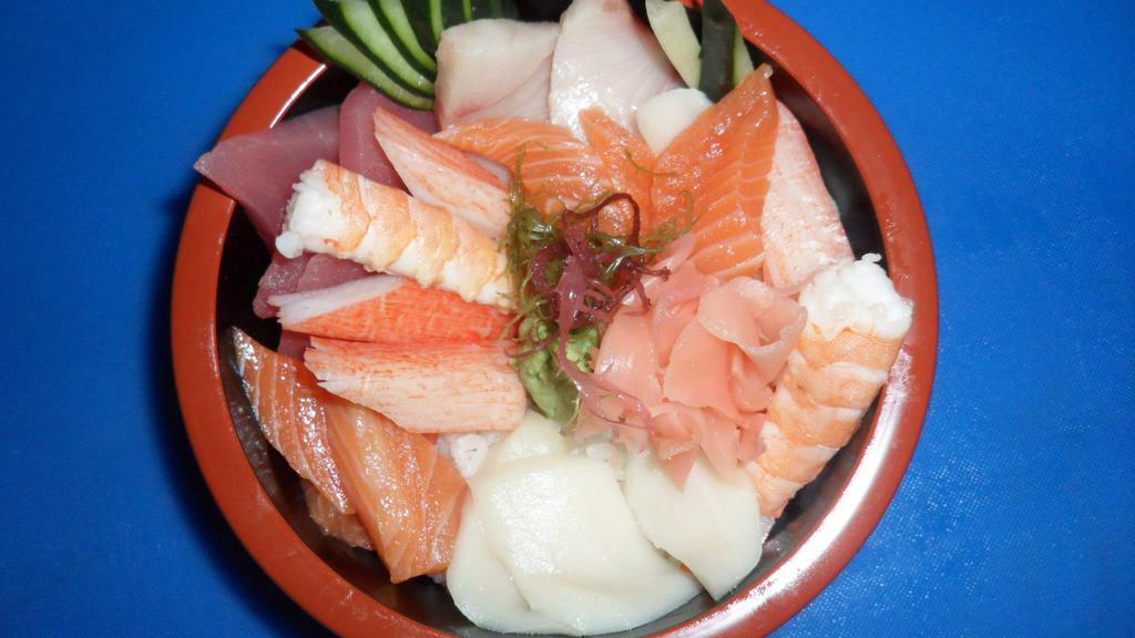 Chirashi Dinner · Bed of steam rice. Topped with variety of fish & veggie.